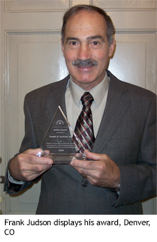 Frank Judson displays his award, Denver, CO 