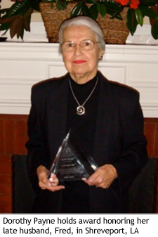 Dorothy Payne holds award honoring her late husband, Fred, in Shreveport, LA 